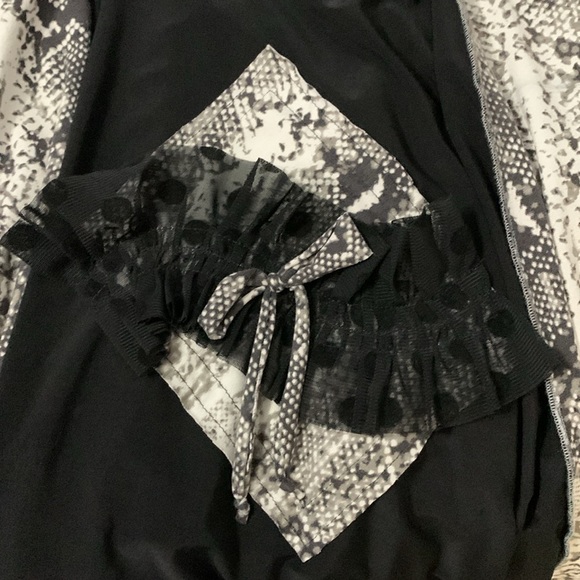 Ruffles and Mudpies brand top. Black and snake print. Size Medium - Picture 4 of 4